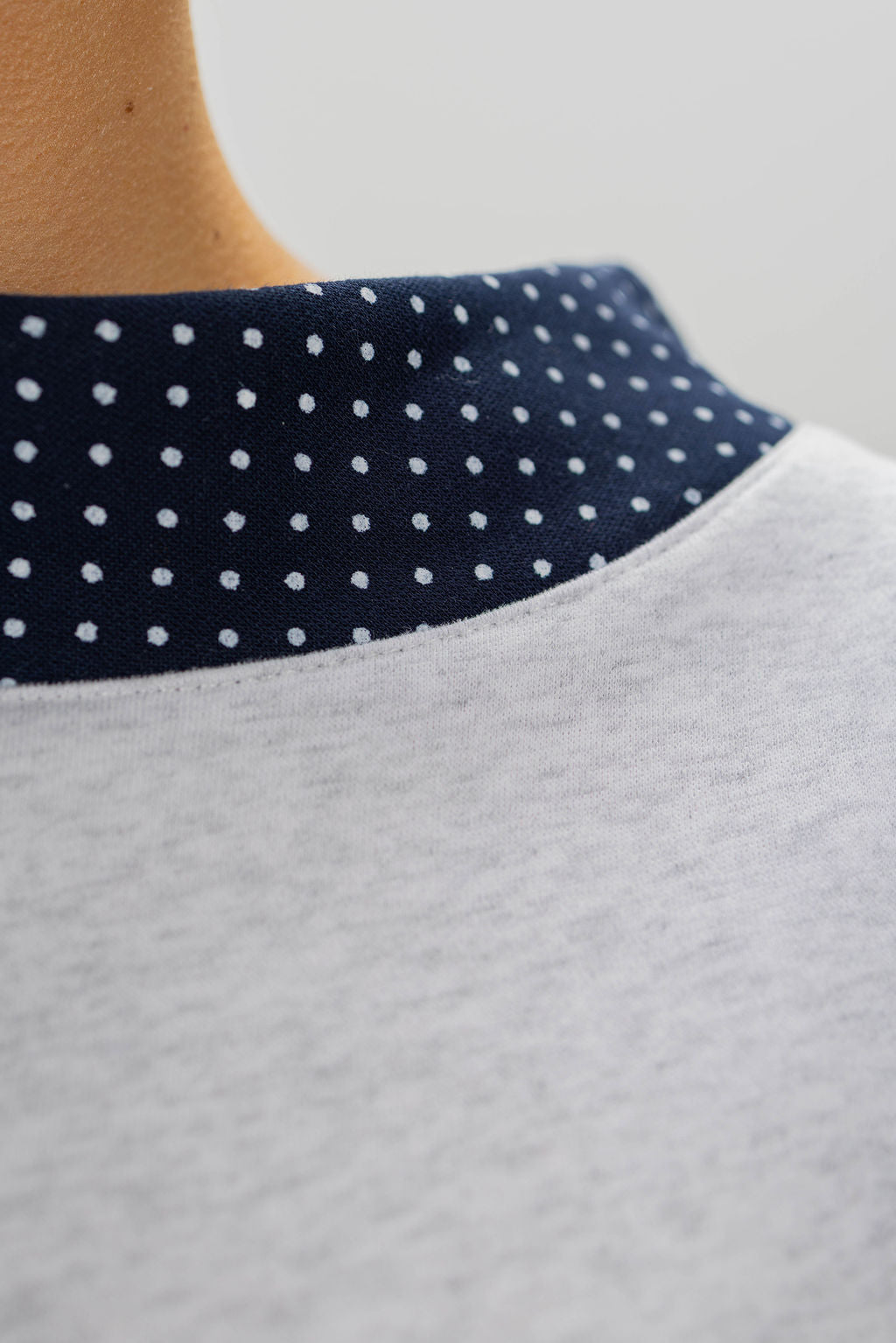 POLKA DOT TRIM MOCKNECK